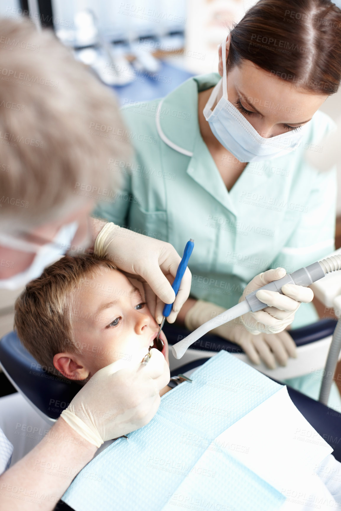 Buy stock photo Dentist, woman and boy with mirror of consultation, teeth whitening and oral inspection of dental hygiene. Orthodontics, child and tools of cleaning procedure, cavity assessment and braces treatment
