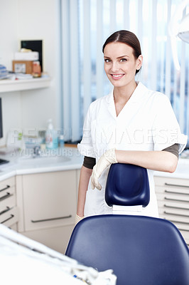 Buy stock photo Portrait of pretty young dental assistant smiling in office