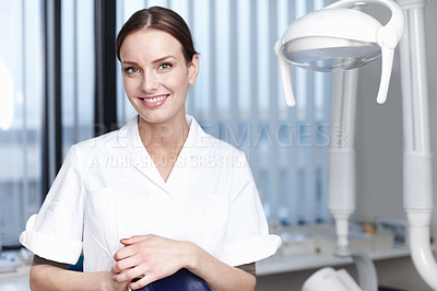 Buy stock photo Portrait, dentist and woman in office, proud and confident for dental health, happy and oral hygiene. Clinic, medical professional and person in uniform for tooth extraction, healthcare and Germany