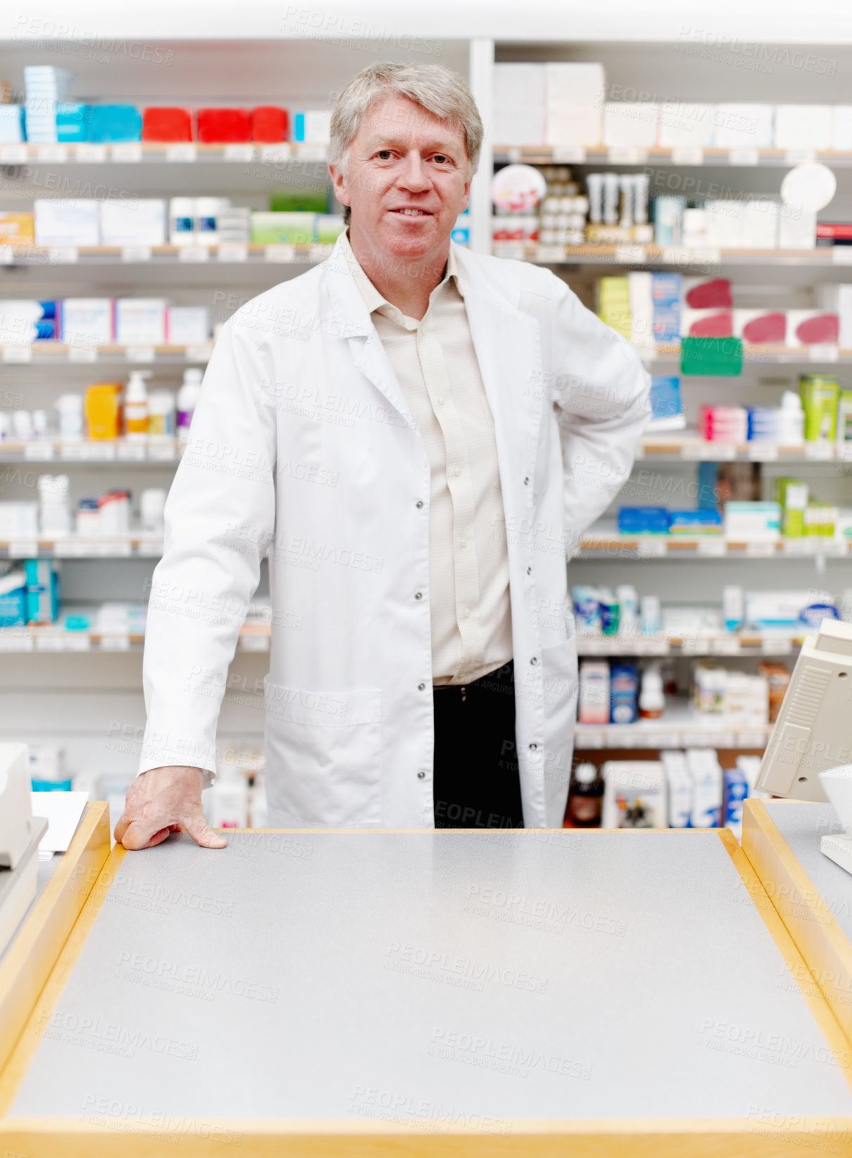 Buy stock photo Man, reading and pharmacist with confidence at dispensary for medication, supplements or pills. Chemist, inventory and mature male apothecary in medical clinic for medicine or tablets in drug store.