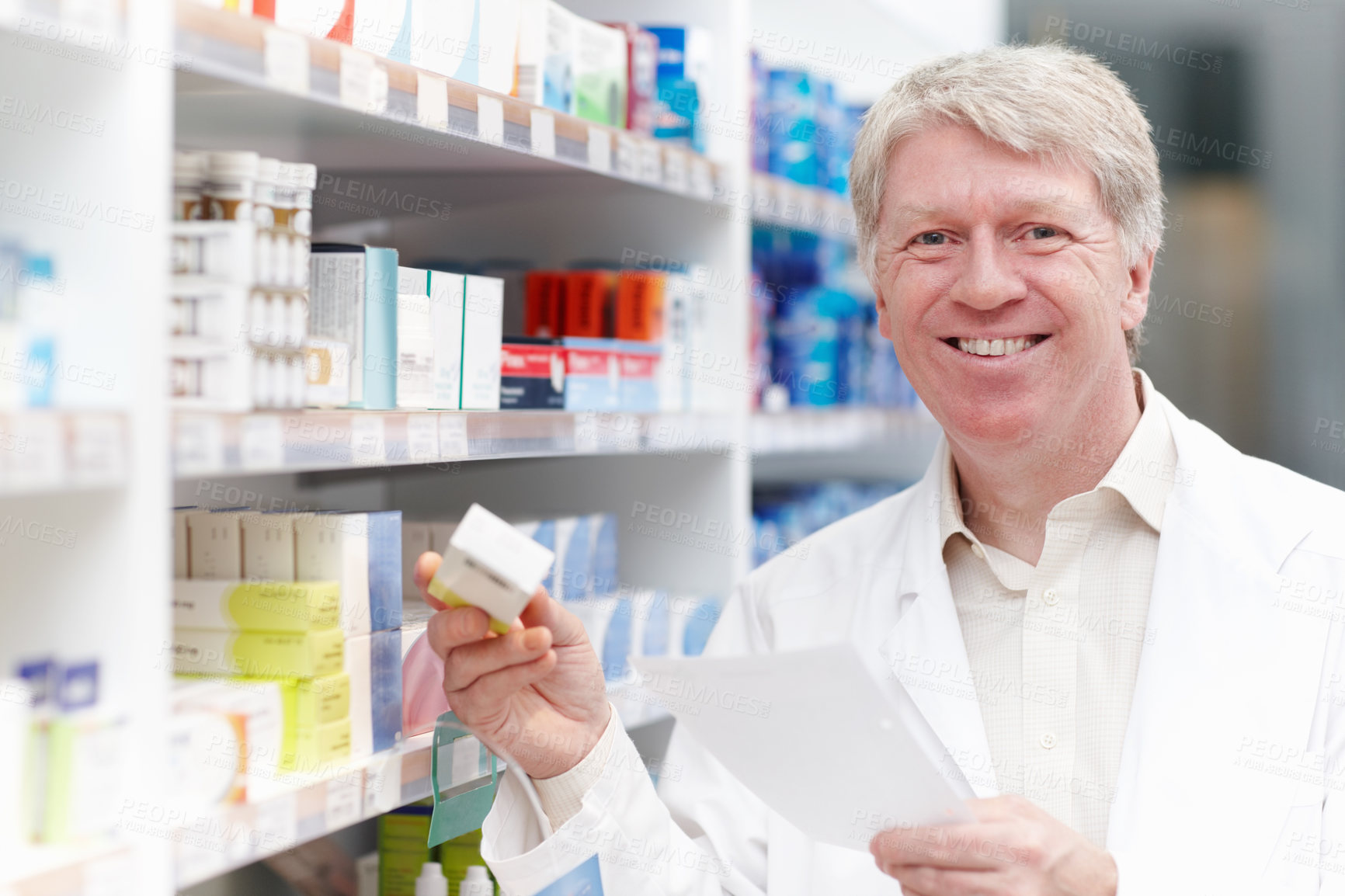 Buy stock photo Man, pharmacist and smile with prescription for medication, pills and box for healthcare at drugstore. Mature person, portrait and happy at pharmacy with checklist for product, medicine and treatment