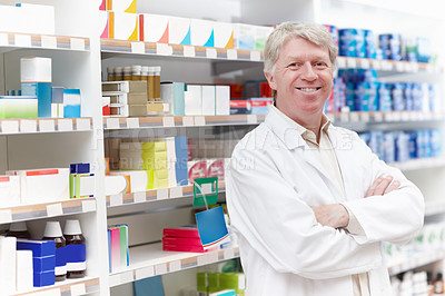 Buy stock photo Man, pharmacist and happy with arms crossed on portrait for medication, prescription and service in Germany. Mature person, shop manager and employee with confidence, smile and pride at pharmacy