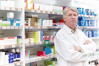 Buy stock photo Man, pharmacist and serious with arms crossed on portrait for medication, prescription and service in Germany. Mature person, shop manager and employee with confidence or pride for drugstore