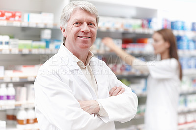 Buy stock photo Man, pharmacist and proud with arms crossed on portrait for medication, prescription and service in Germany. Mature person, shop manager and employee with confidence, smile and happy at drugstore