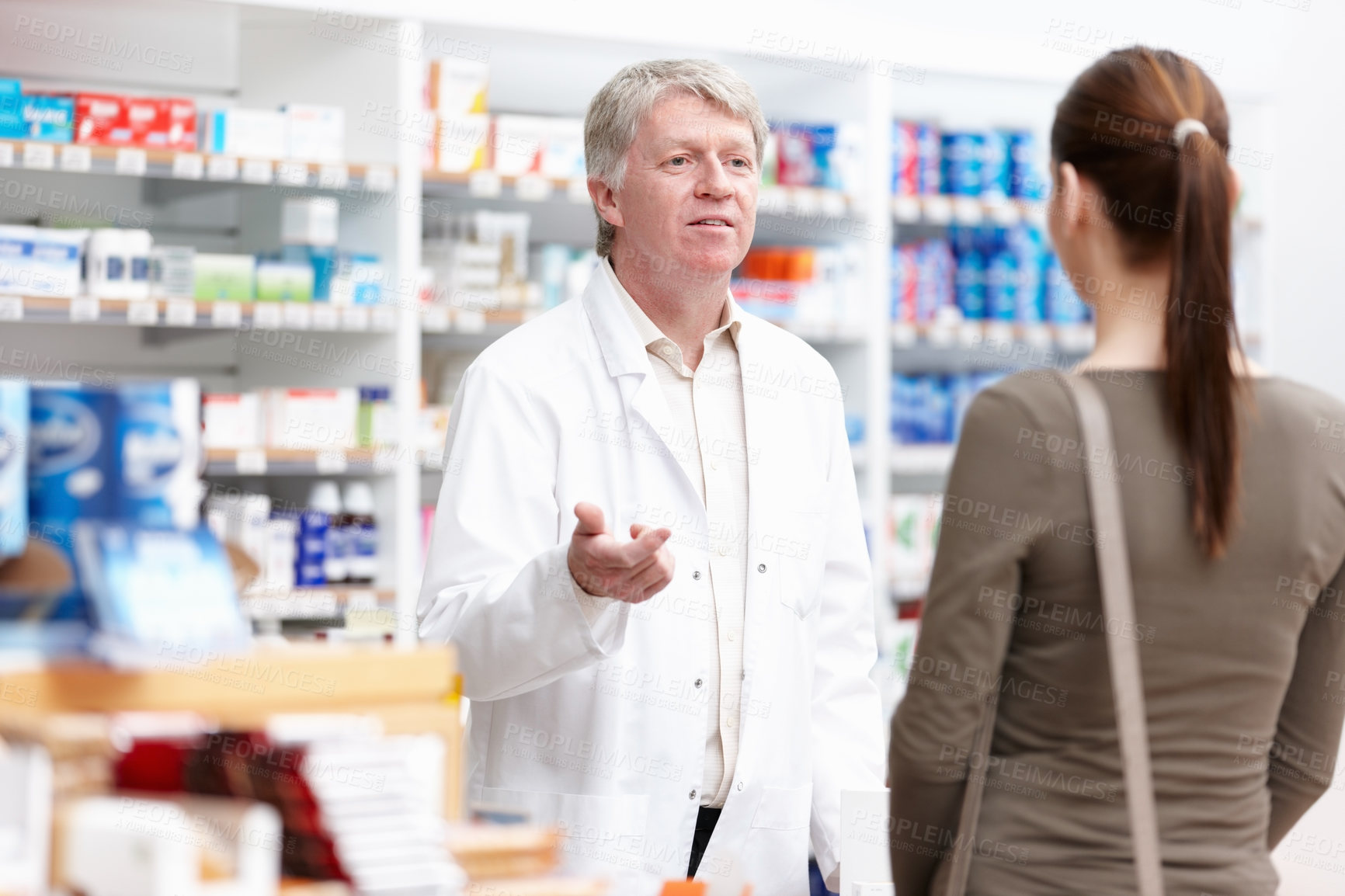 Buy stock photo Pharmacist, customer and support for wellness, care or medicine as drugstore, chemist or pharmacy. Medical professional, male person and woman for prescription or info in dispensary as advice or help