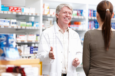 Buy stock photo Pharmacist, customer and advice for wellness, care or medicine as drugstore, chemist or pharmacy. Medical professional, male person and woman for prescription or info in dispensary as support or help