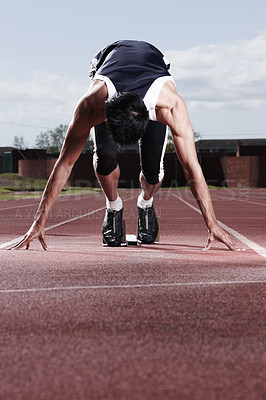 Buy stock photo Runner, start and man with fitness, challenge and ready with energy, exercise and routine. Person, healthy and athlete on track, sports and workout with wellness, goals and marathon with competition