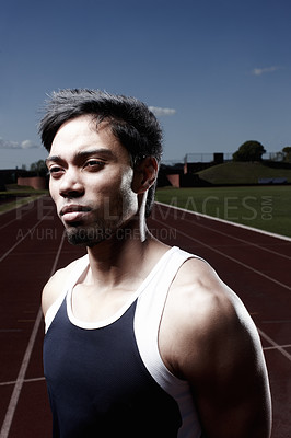 Buy stock photo Thinking, runner or face of man on track for training, late outdoor workout or sports exercise. Night, fitness ideas and confident male athlete in stadium for running development or race performance