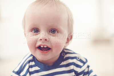 Buy stock photo A cute little baby boy with bright blue eyes 