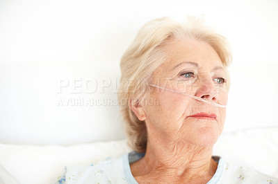 Buy stock photo Sick, old woman and thinking of illness, hospital and depression for disease, healthcare and medicine. Mental health, contemplating and senior person with dementia, treatment and stress for recovery