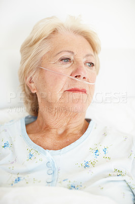 Buy stock photo Sick, old woman and thinking of illness, healthcare and depression for disease, hospital and medicine. Mental health, contemplating and senior person with dementia, treatment and stress for recovery