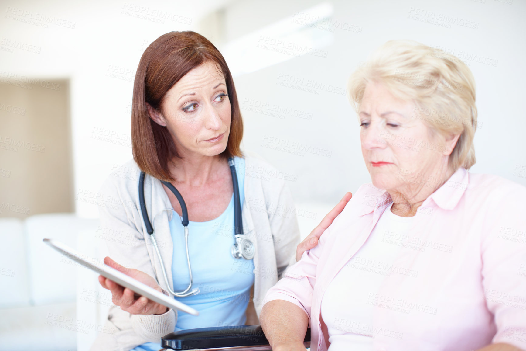 Buy stock photo Woman, patient and doctor with tablet for elderly care, consultation or bad news at clinic. Female people, healthcare worker or employee talking to senior person with technology for medical results