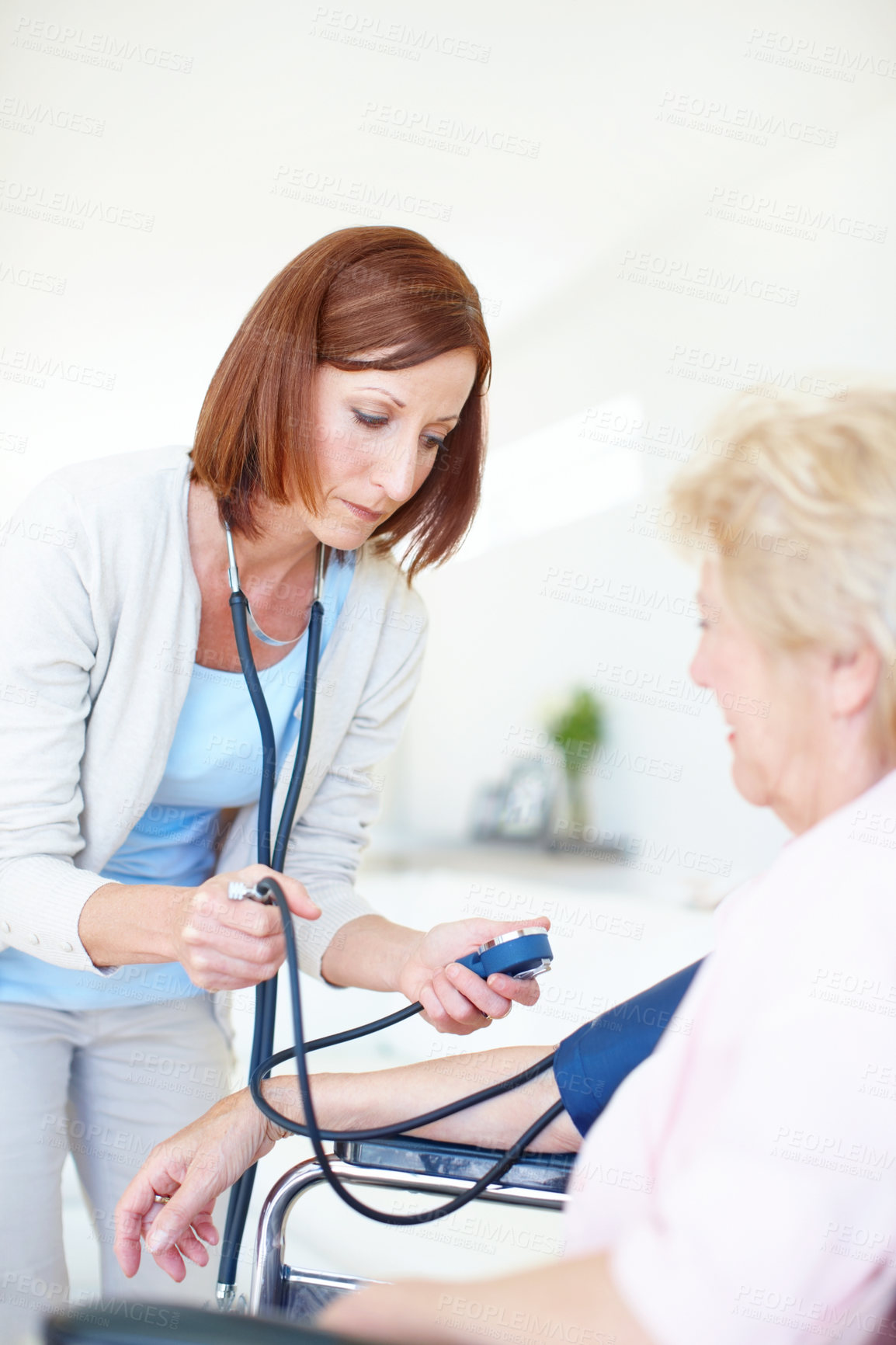 Buy stock photo Blood pressure, wheelchair and doctor with senior woman for medical service, exam and consulting. Healthcare, retirement and elderly person with disability for diabetes, heart rate and hypertension