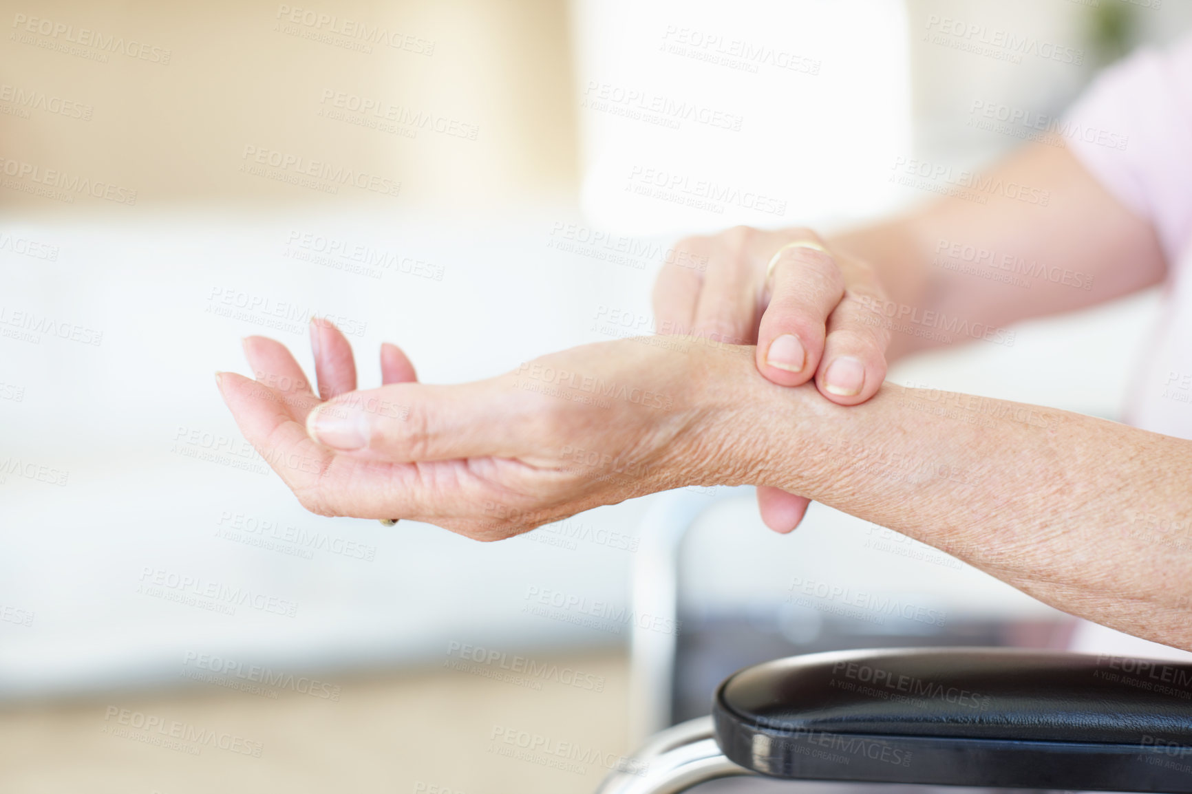 Buy stock photo Senior, woman and hands checking pulse for circulation, hypertension and healthcare in nursing home. Retirement, care and elderly person with wrist test for heart beat, blood pressure or wellness. 