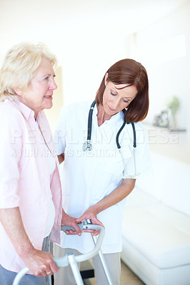 Buy stock photo Walker, doctor and helping senior woman for mobility support, recovery or rehabilitation. Professional, nurse or elderly person with disability in retirement for guide, balance or arthritis treatment