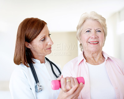 Buy stock photo Rehabilitation, weights and physiotherapy with old woman and nurse for retirement, muscle and consulting. Medical, osteoporosis and exam with senior person and dumbbell for fitness, support or clinic