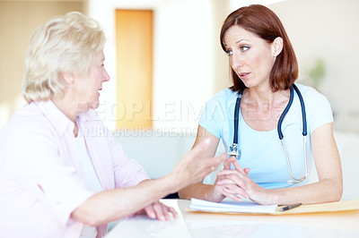 Buy stock photo Medical, consulting and doctor with old woman in hospital for advice, discussion and healthcare report. Wellness, feedback and diagnosis with patient and person in clinic for treatment and support