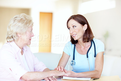 Buy stock photo Holding hands, support and doctor with old woman in hospital for consulting, discussion and healthcare. Wellness, feedback and diagnosis with patient and person in clinic for treatment and medical