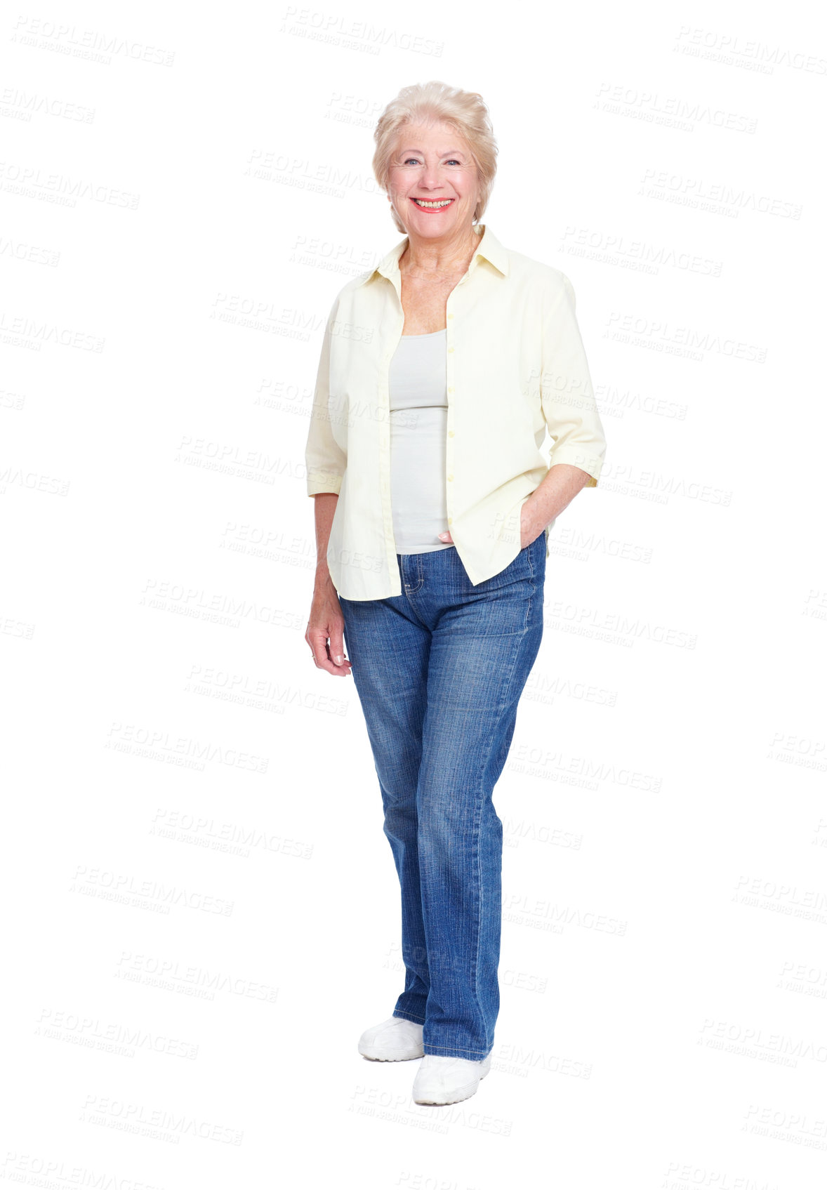 Buy stock photo Happy senior woman looking confident while isolated against a white studio background with copyspace. Portrait of an attractive mature lady feeling positive and cheerful while standing alone 