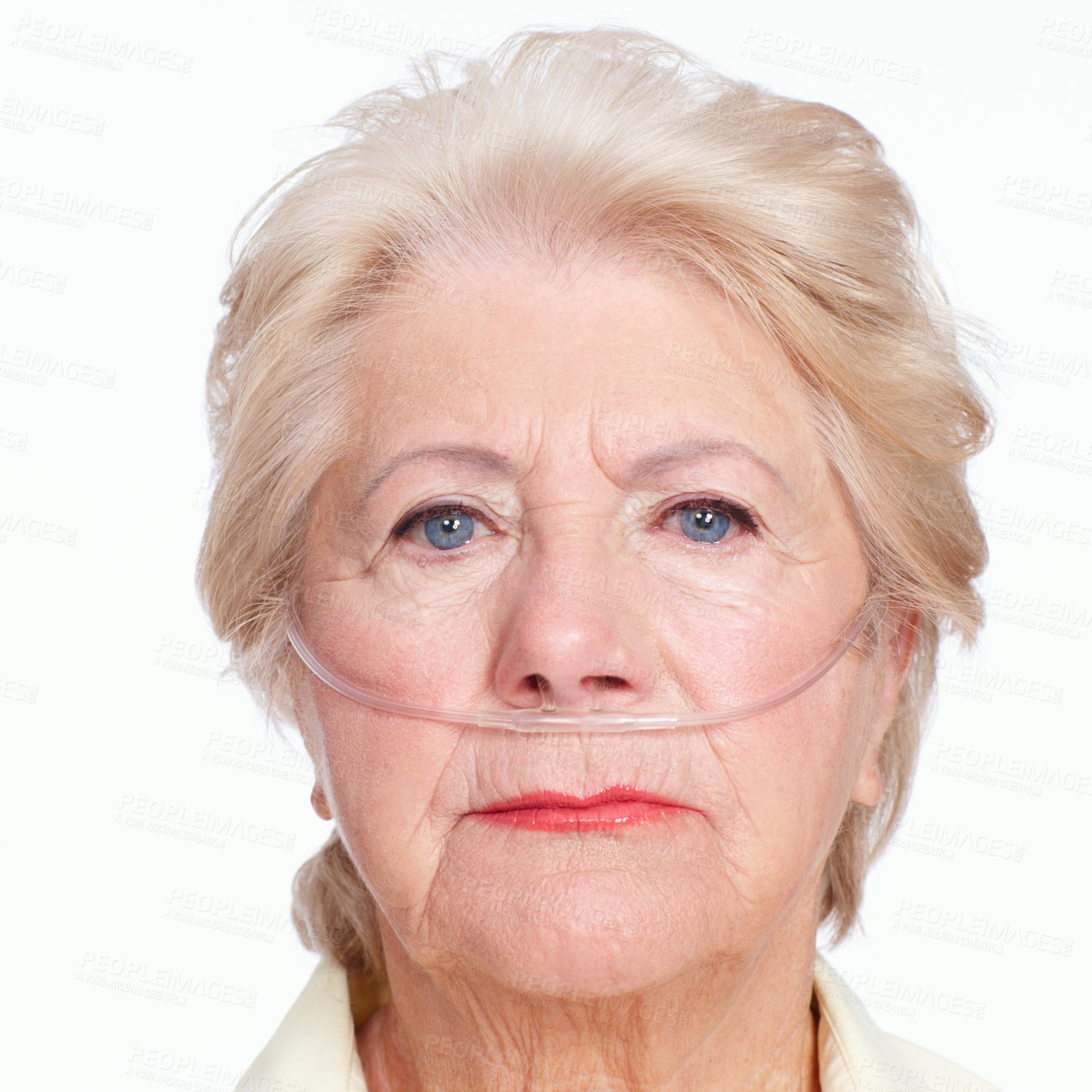 Buy stock photo Closeup portrait of a sickly senior woman wearing a nasal cannula for oxygen - Isolated on White