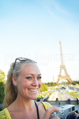 Buy stock photo Portrait of a beautiful young woman taking photos while sight seeing in the Paris