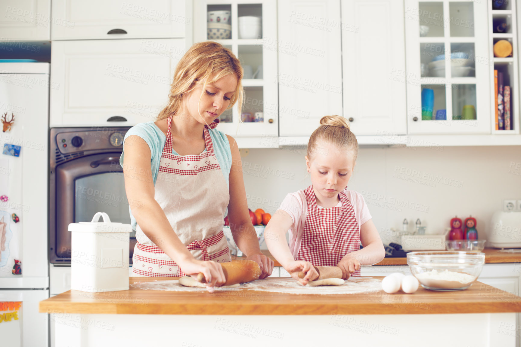 Buy stock photo Mother, girl and rolling pin for baking in kitchen, dough preparation and teaching child skill in home. Mama, daughter and love for helping with cookies, cooking wheat and kid learning with tool