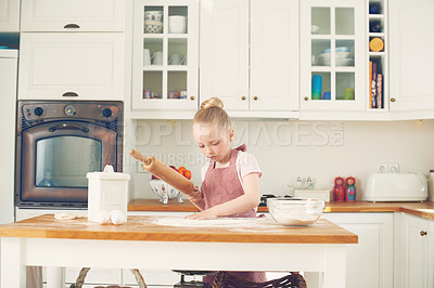 Buy stock photo Baking, home and child in kitchen with dough for learning to bake cake, dessert and pastry. Development, culinary skills and young girl with ingredients, recipe and food for sweet treats on counter