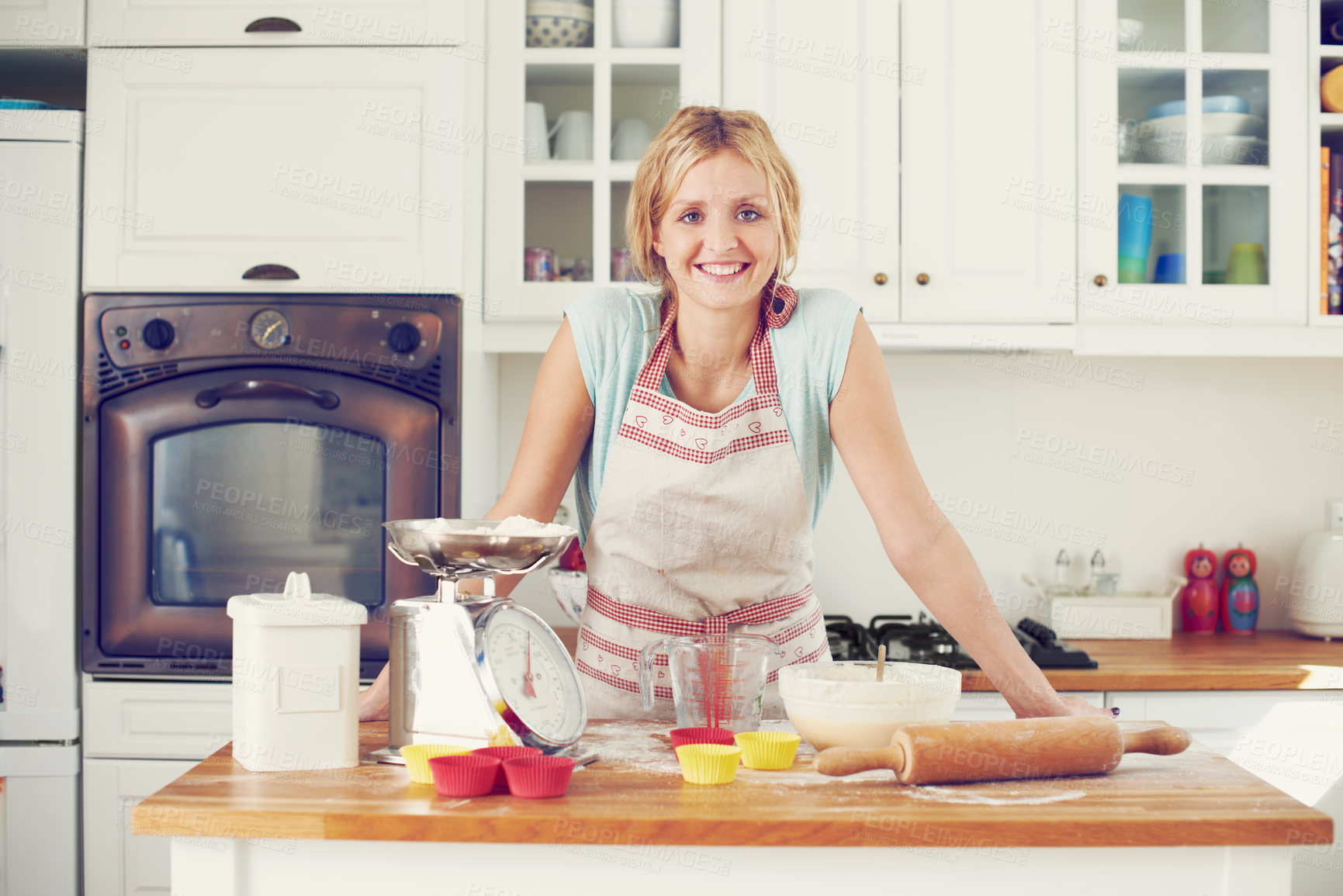 Buy stock photo Portrait, smile and woman in kitchen for baking, meal prep or happy morning cooking in house. Food, baker or home chef in apron with confidence, pride and ingredients at small business dessert bakery