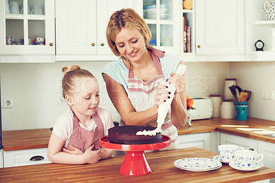 Buy stock photo Baking, cake and decoration with mother and child in kitchen for helping, ingredients and dessert recipe. Cookie, learning and baker with girl and woman in family home for support, cooking and food