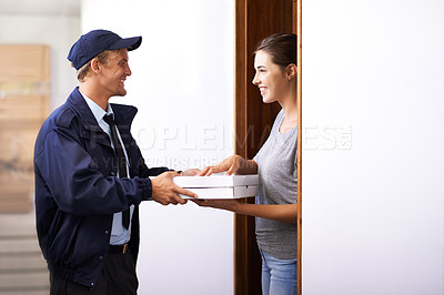 Buy stock photo Pizza, delivery and man with customer in home, giving a box and easy service to front door. Ecommerce, courier and happy woman with fast food, takeaway order and thank you for transport of package