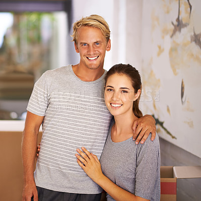 Buy stock photo Happy couple, moving and portrait for Mortgage loan, new home and property investment in hallway of house. Real estate, face of man and woman with hug for apartment, relocation and cardboard box.