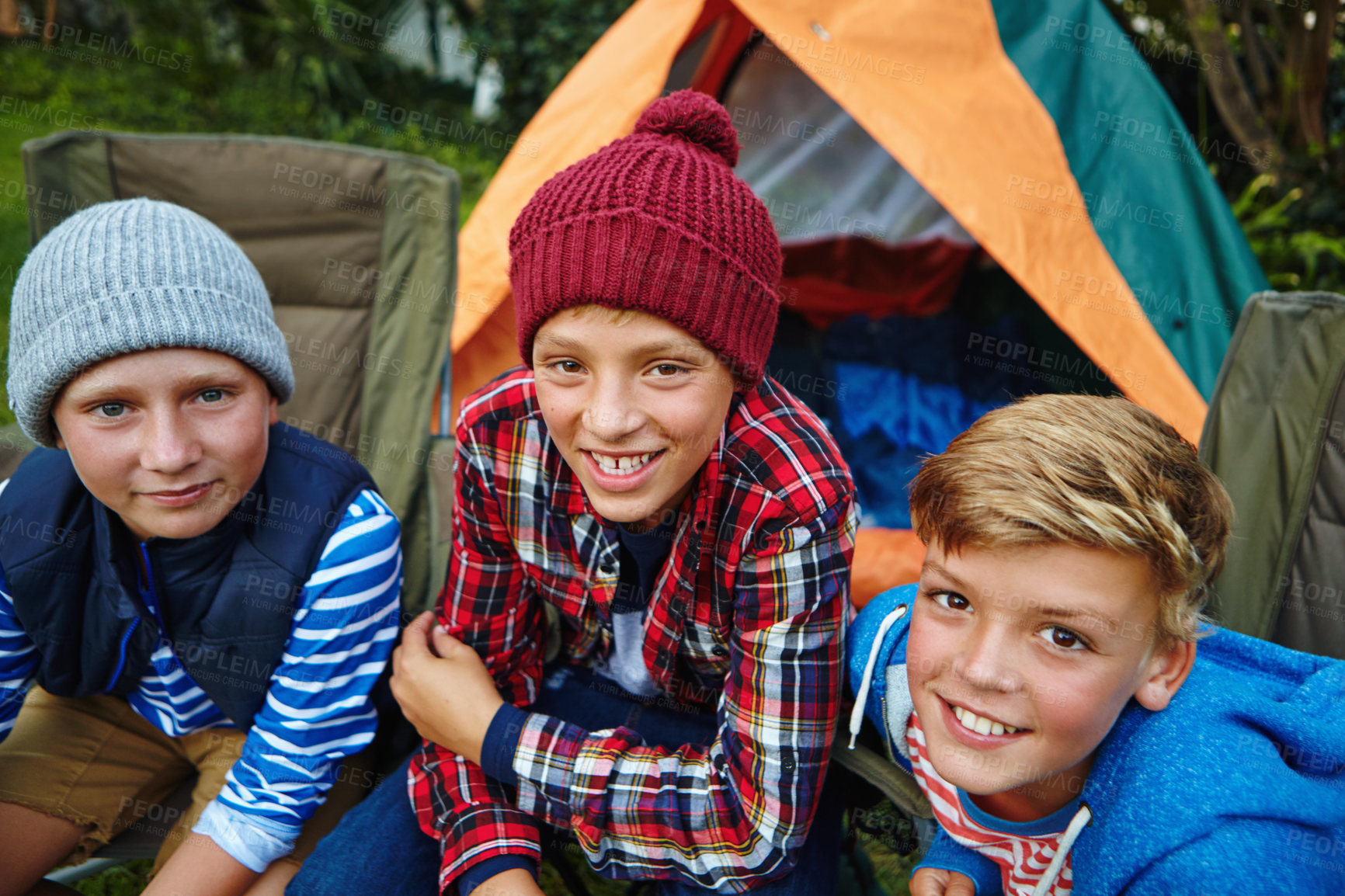 Buy stock photo Cropped shot of three young boys camping