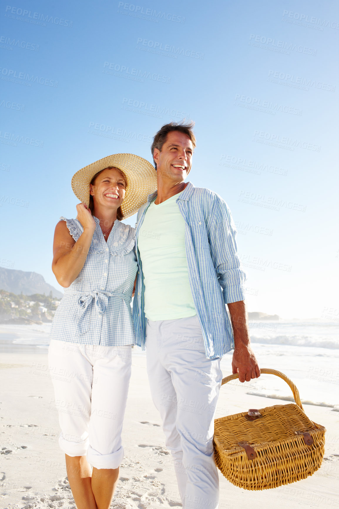 Buy stock photo Thinking, beach and mature couple with picnic, basket and love for summer vacation in Miami. Man, woman and smile with ocean, holiday and bonding for relationship anniversary or weekend date by sea