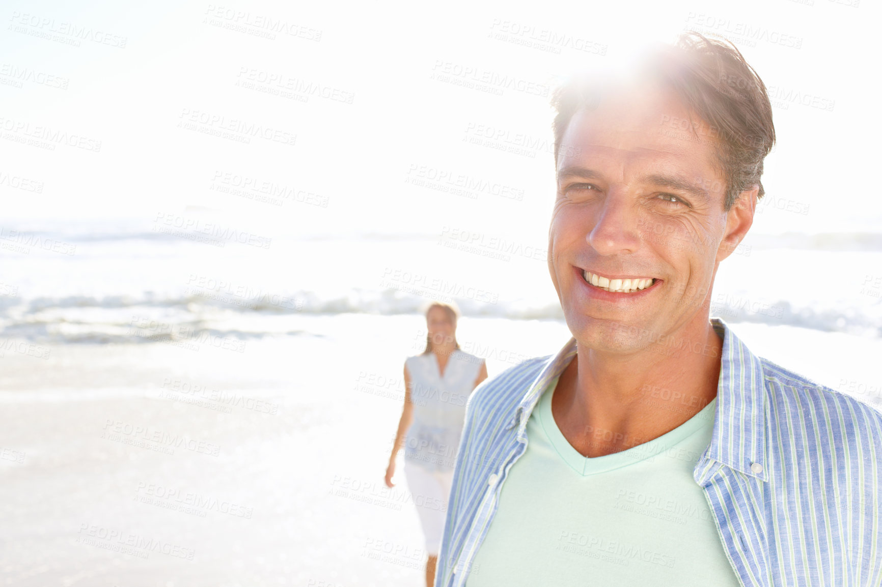 Buy stock photo Relax, happy man or couple at sea for portrait or love on vacation, anniversary or honeymoon holiday. Paradise, face or people with smile at beach to relax together for travel, bonding or ocean trip