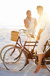Biking on the beach together