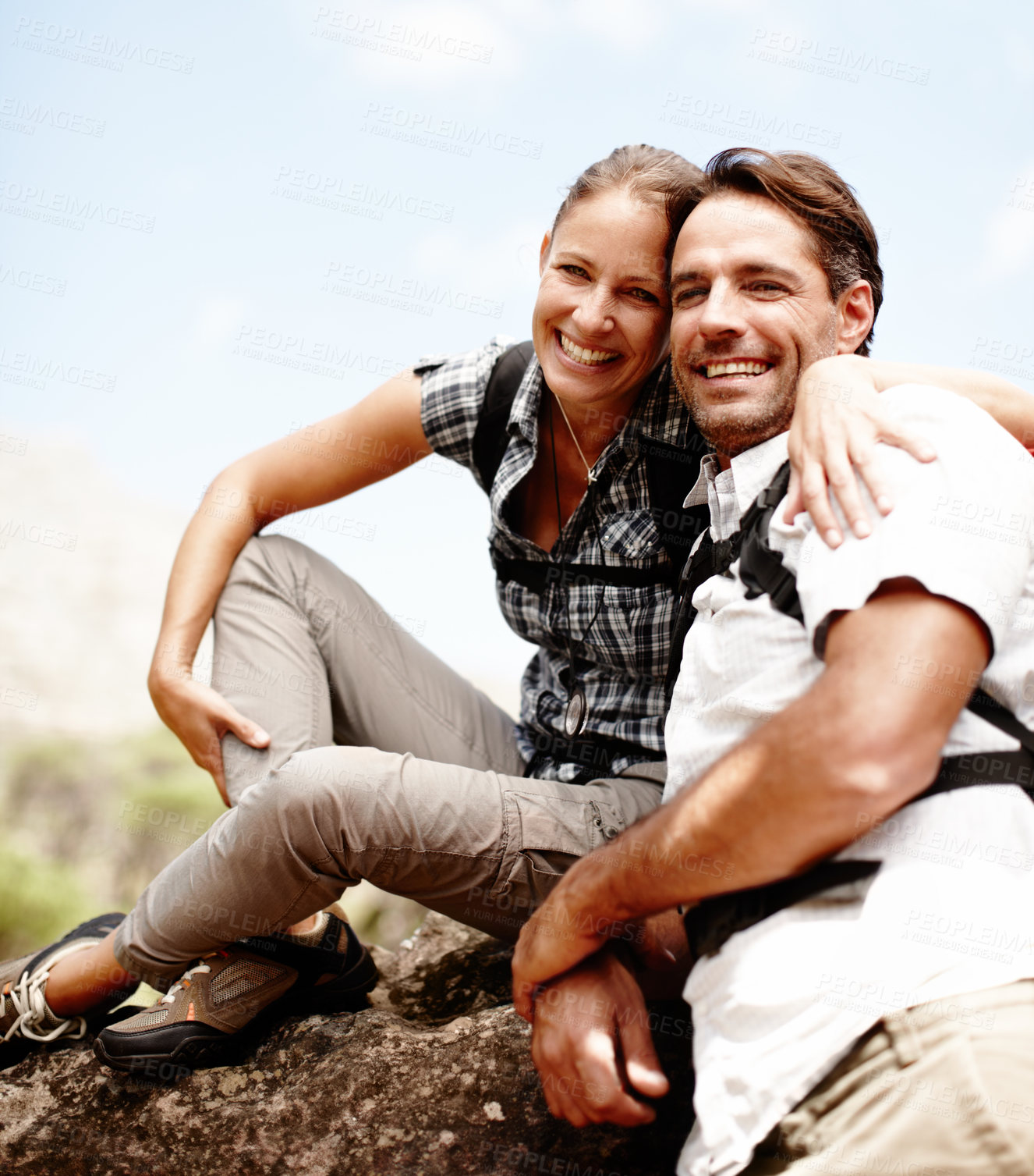 Buy stock photo Couple, portrait and outdoor hug for hiking, mountain cliff and adventure in Costa Rica. Happy people, embrace and support relationship by trekking in nature, journey and together on trip in woods