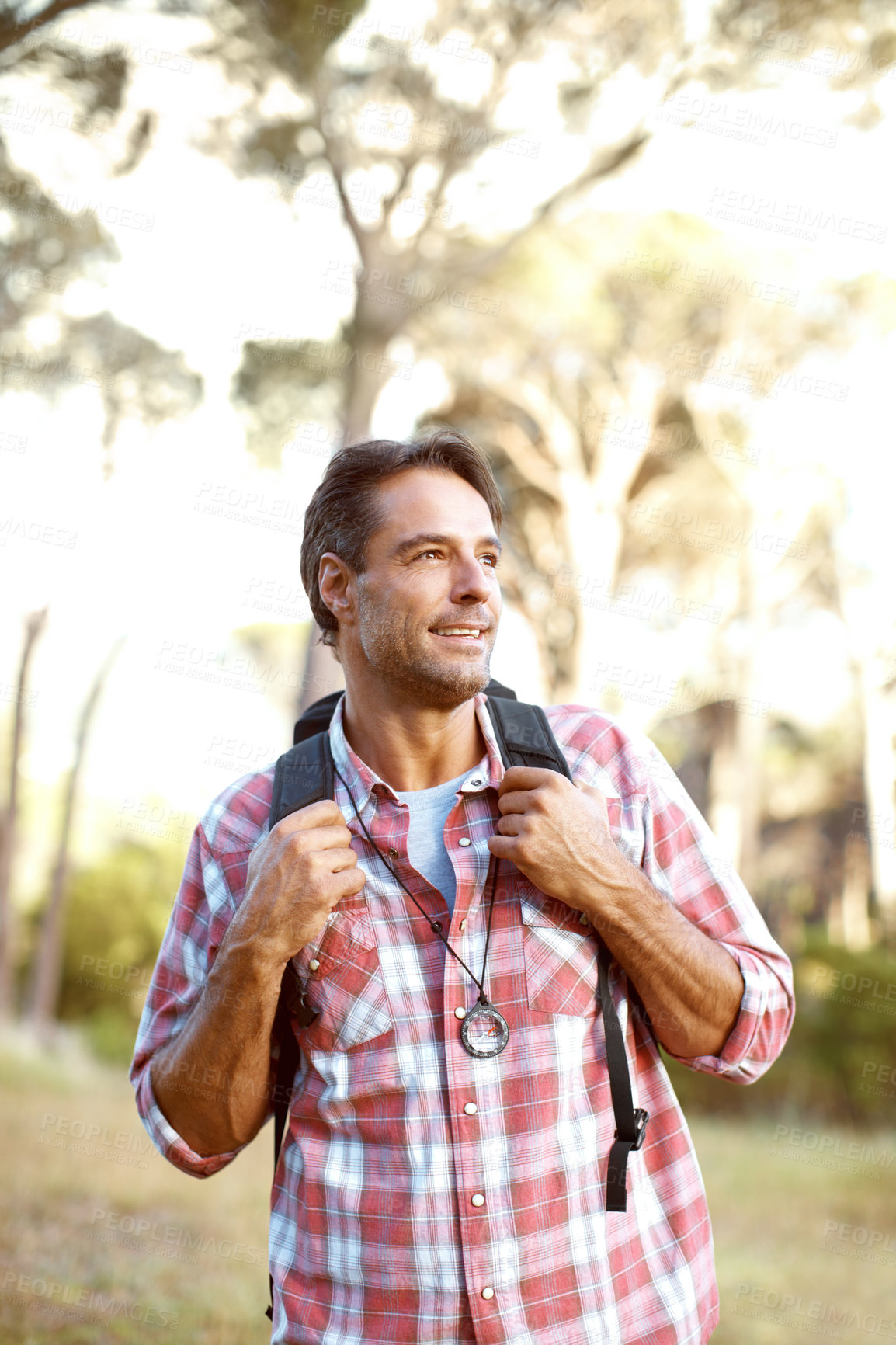 Buy stock photo Hiking, trekking and thinking with man in nature for wildlife biologist, field research and ecology. Vision, travel and adventure with person in forest for environment study, conservation and idea