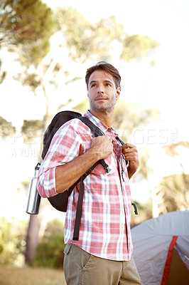 Buy stock photo A handsome young man enjyoing nature