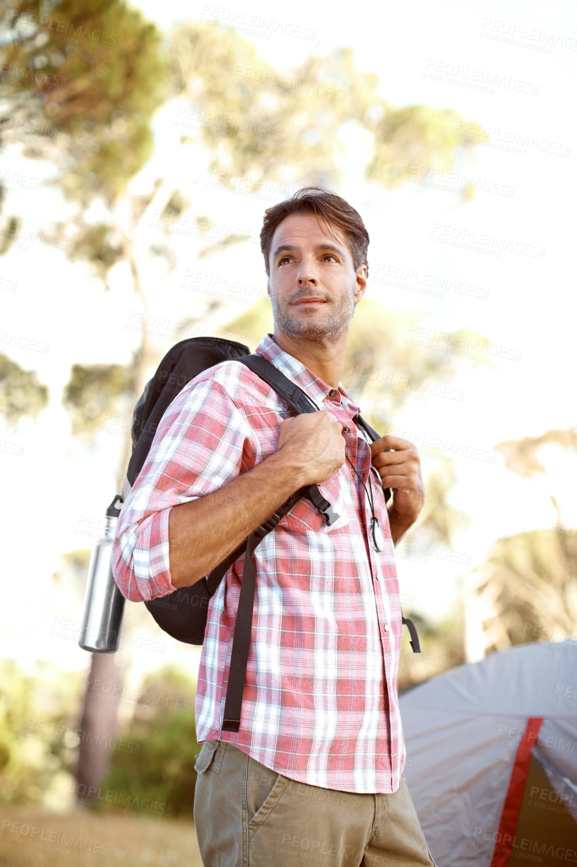 Buy stock photo Man, thinking and backpack for camping, tent and outdoor with perspective, adventure and journey in summer. Person, progress and hiking with direction, bag and vacation with sunshine in Argentina