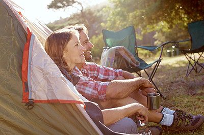 Buy stock photo A young couple enjoying the outdoors together