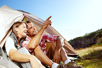 Buy stock photo A young couple enjoying nature together