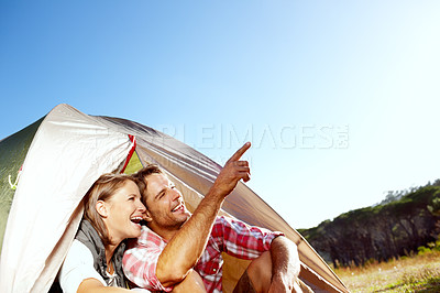 Buy stock photo A happy couple enjoying nature together