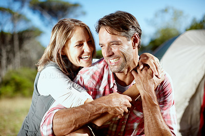 Buy stock photo Couple, happy and hugging in forest with camping for anniversary holiday, laughing and support in nature. Mature, people and love with embrace in woods for connection, protection and security outdoor