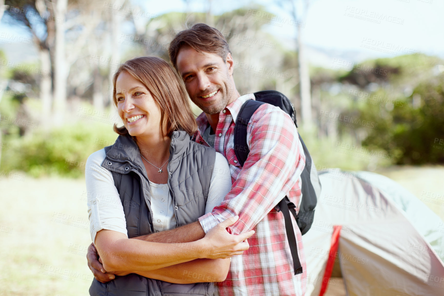 Buy stock photo Camping, hug and portrait of couple on mountain with tent for outdoor holiday, vacation and adventure, Campsite, travel and happy man and woman embrace in nature for bonding, trekking and hiking