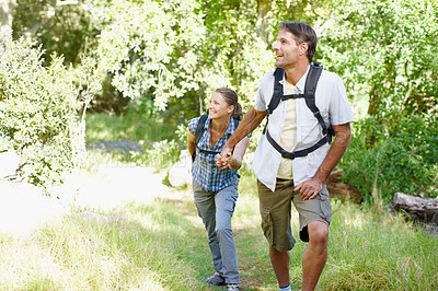 Buy stock photo Couple, walking and holding hands in nature for hiking, fitness and adventure with bonding and support. Man, woman and love outdoor for exercise, health and trekking with journey, travel or challenge