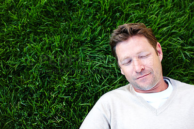 Buy stock photo Top view, man and sleeping in nature for peace, outdoor lawn and travel to Florence countryside. Male person, eyes closed and rest in environment for wellness, garden health and dreaming in nap