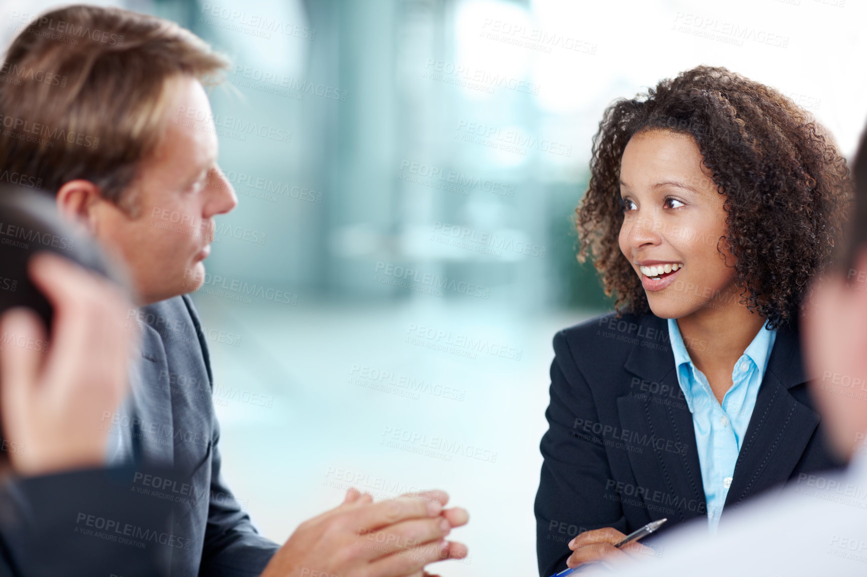 Buy stock photo Happy woman, team meeting and business people in discussion, planning or problem solving. Group, smile and manager brainstorming ideas, insurance and risk management solution in corporate office

