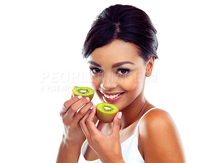 Buy stock photo Portrait, smile and woman with kiwi, nutrition and sustainable eating to lose weight in studio. Green fruit, face and girl with fresh food for detox diet, vitamin c and gut health on white background
