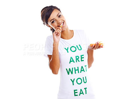 Buy stock photo Young woman, health and eating carrot for nutrition, wellness and balanced diet isolated in studio. Female person or model and with smile for fruit tshirt, vegan awareness and pride with organic food