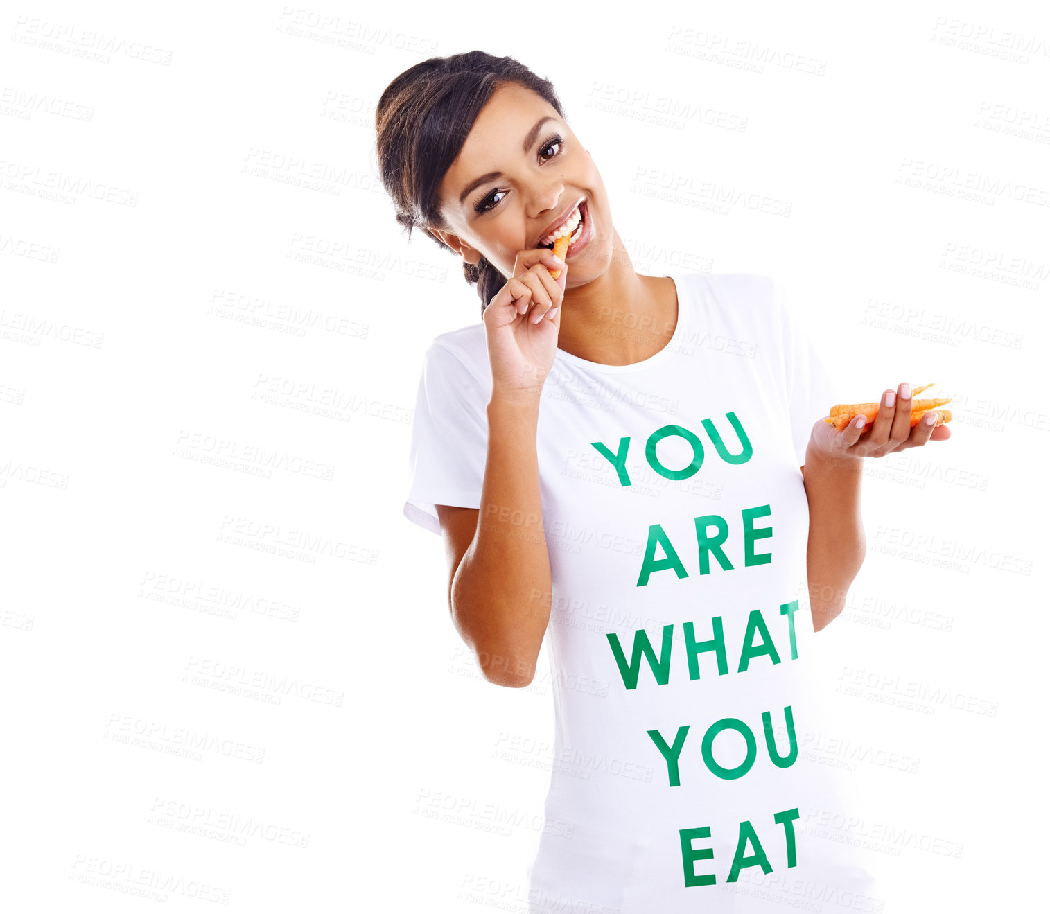 Buy stock photo Young woman, health and eating carrot for nutrition, wellness and balanced diet isolated in studio. Female person or model and with smile for fruit tshirt, vegan awareness and pride with organic food